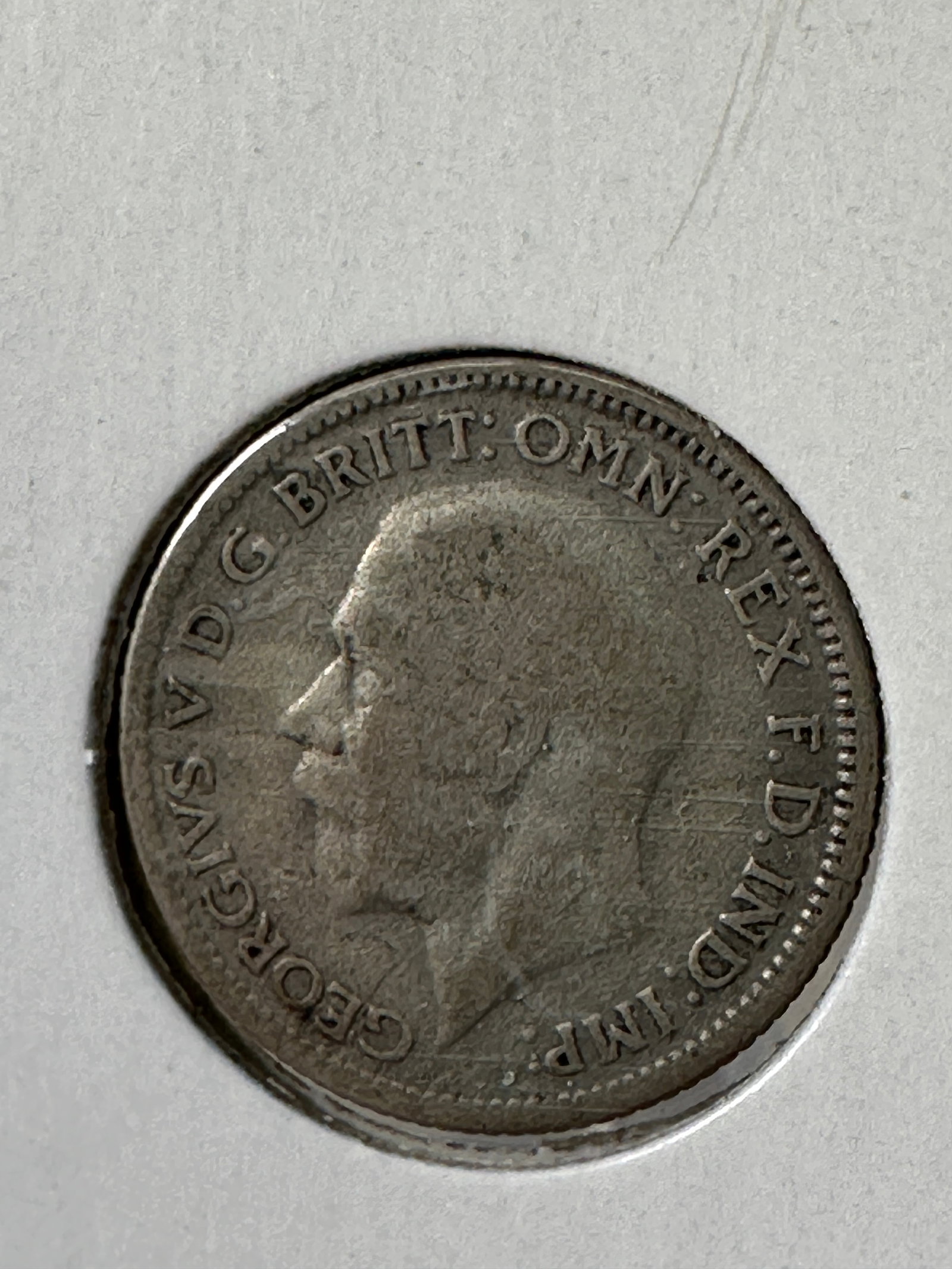 1929 Great Britain Six Pence .500 Silver Coin - George V: One coin as titled. Ungraded; condition varies. See images.