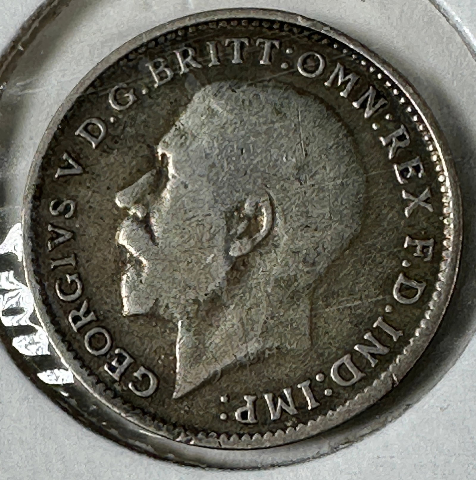 1922 Great Britain 3 Pence .500 Silver Coin - George V: One coin as titled. Ungraded; condition varies. See images.