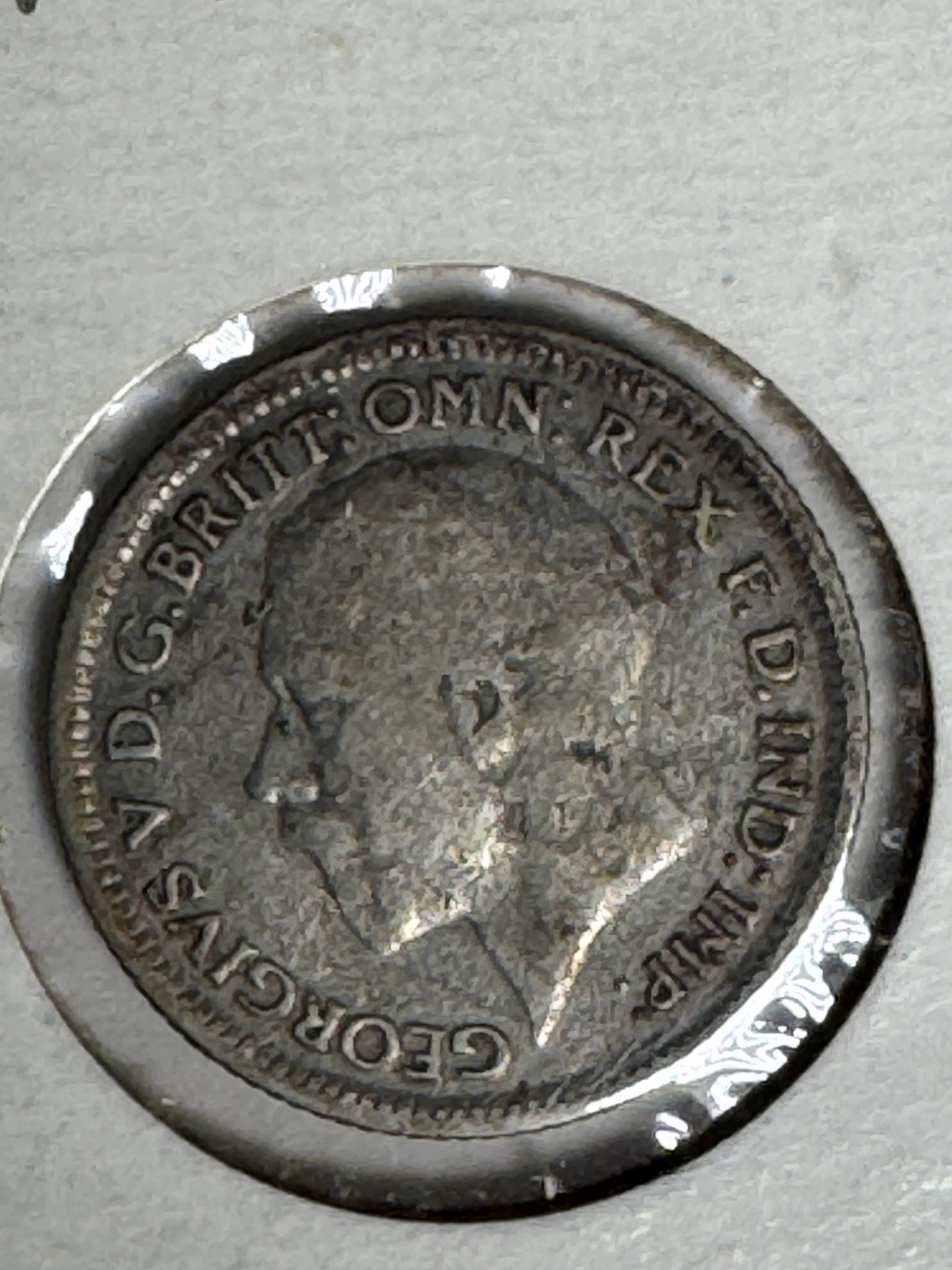 1929 Great Britain Six Pence .500 Silver Coin - George V: One coin as titled. Ungraded; condition varies. See images.