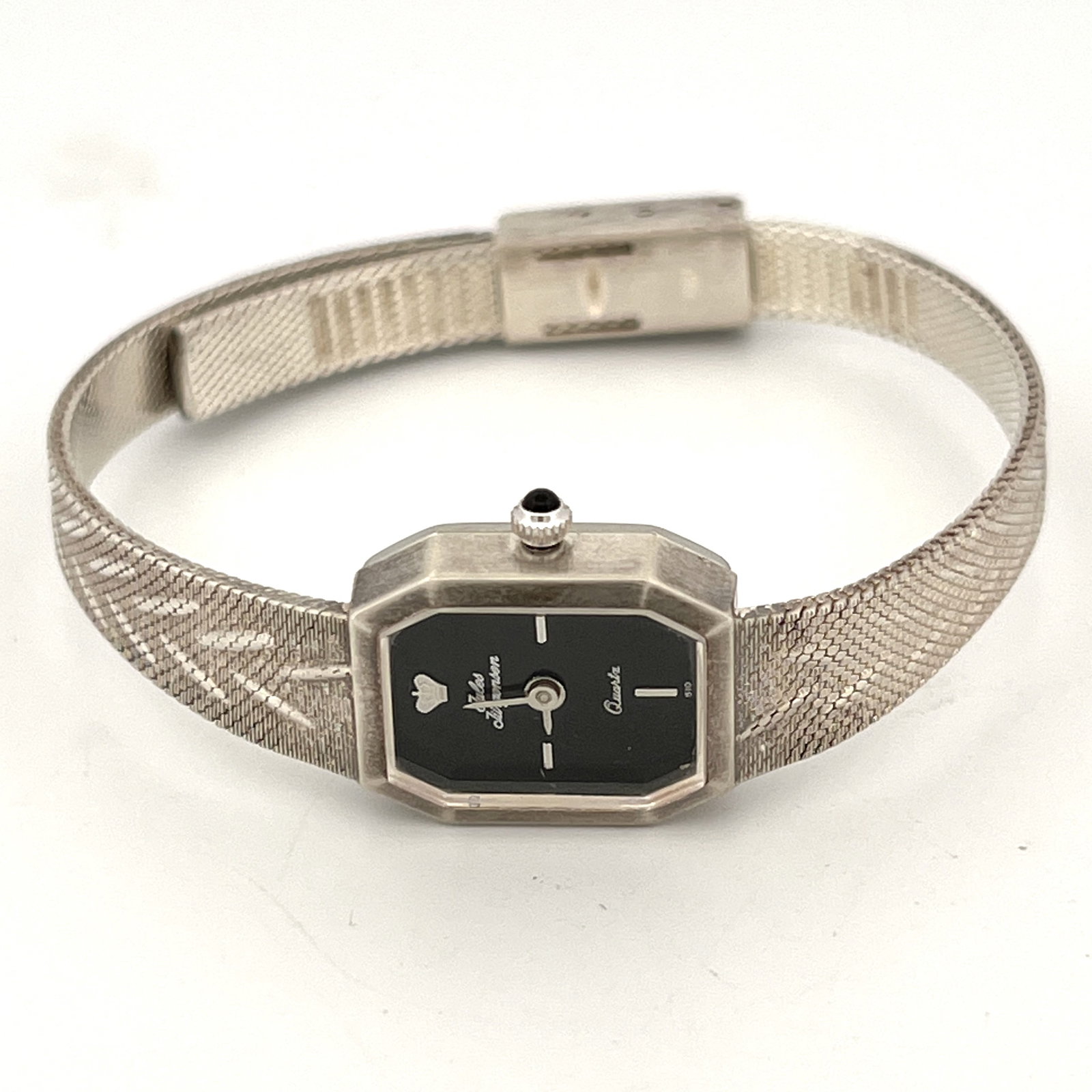 Jules Jurgensen 510 Ladies' Quartz Wristwatch: Ladies' Jules Jurgensen 510 quartz wristwatch. Features a black dial, base metal bezel, and steel back. Features a distinctive stylized mesh band.