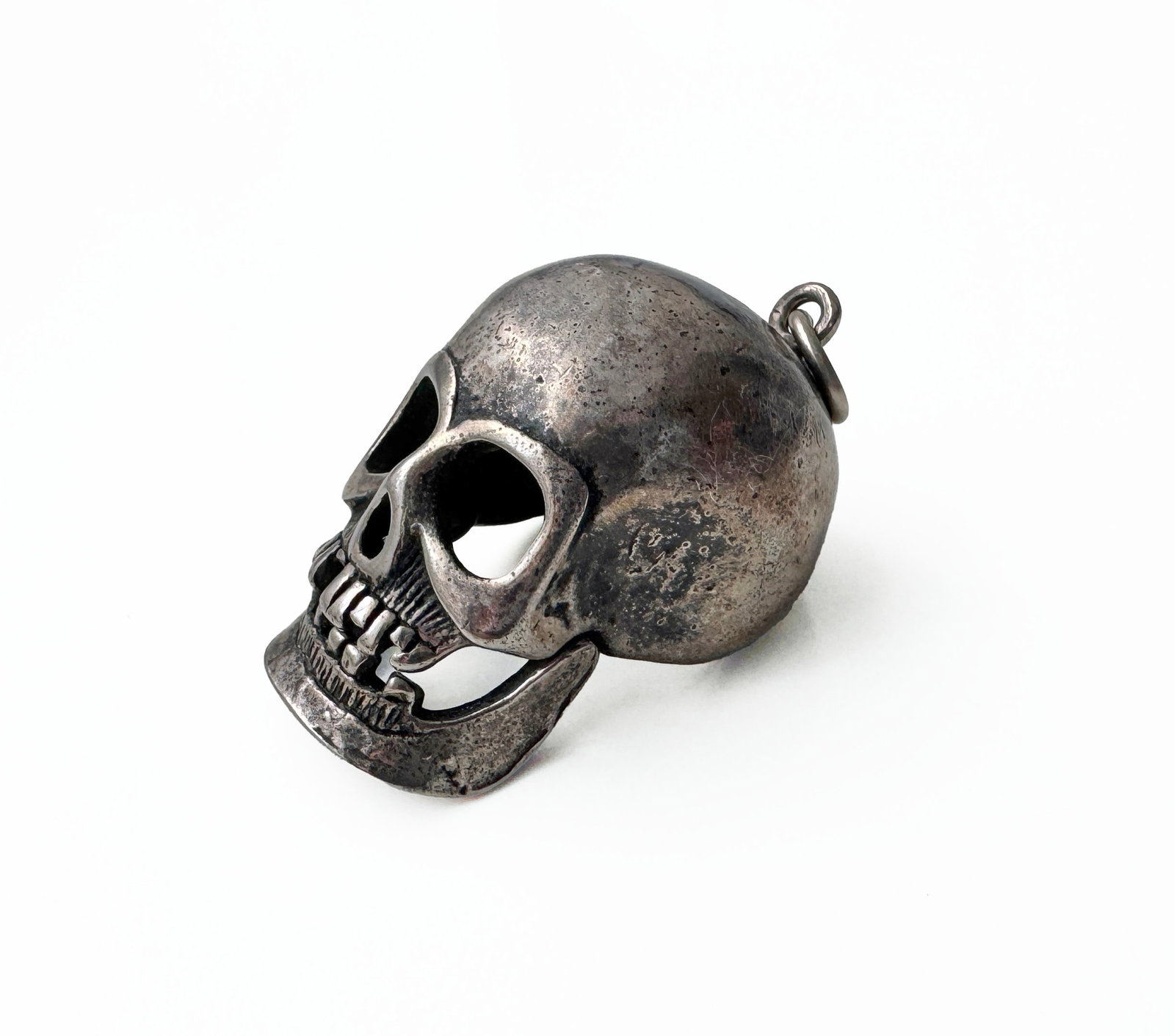 Sterling Silver Articulated Skull Pendant: 20 grams, 30mm widest