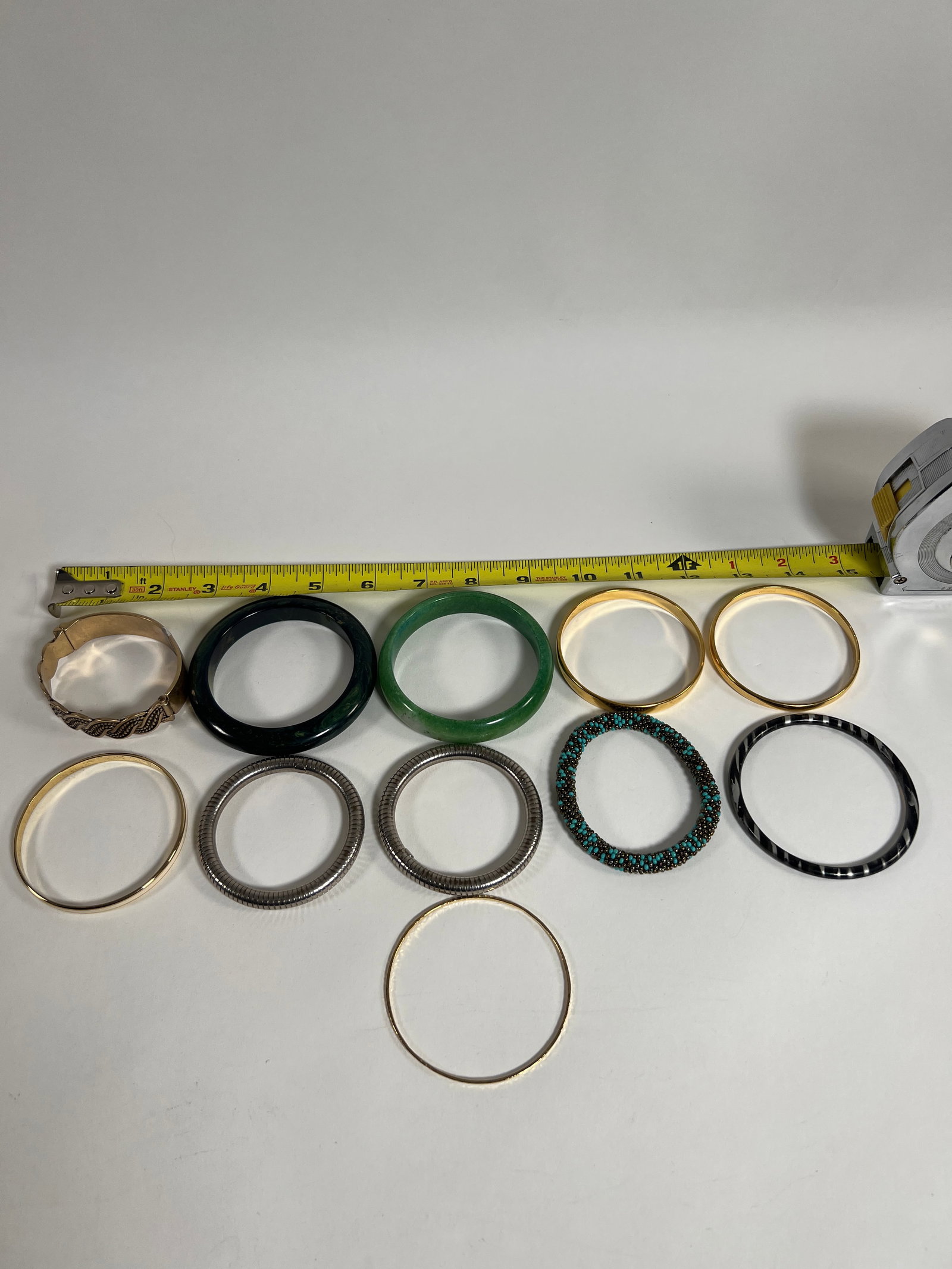 Eleven Assorted Bangles - 16