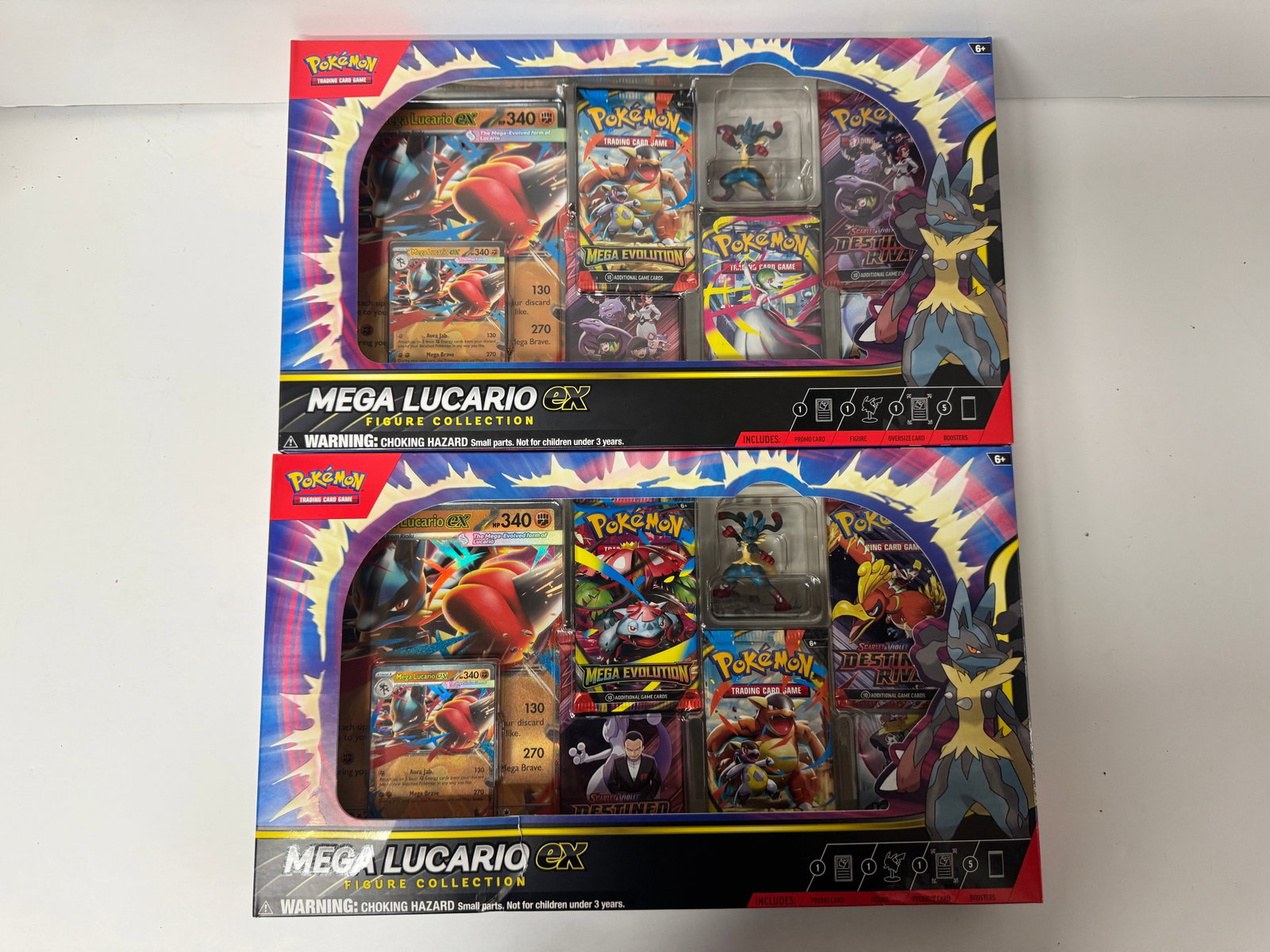 Pokemon TCG Mega Lucario EX Figure Collection - 2 Boxes: This lot includes two identical Pokemon TCG Mega Lucario EX Figure Collection boxes. Each box contains a full-art foil card featuring Mega Lucario EX, a Mega Lucario EX oversized card, 4 Pokemon TCG b