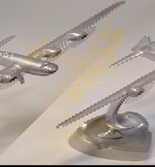 4-Engine B-29 Super Fortress Bomber Model: WW II , art deco style stand with all original paint, excellent condition, 9¼" wing span.