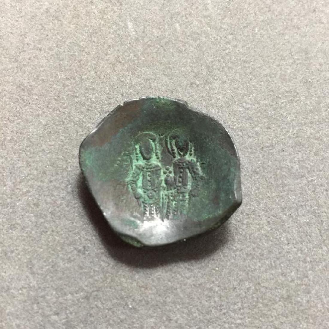 Byzantine Empire Coin, 1195-1215 AD: Byzantine Empire, Alexius III Angelus Comnus billon trachy coin. Constantinople mint. 1195 - 1203 AD. Obverse - beardless nimbate bust of Christ, wearing pallium & colobium, raising right in benedicti