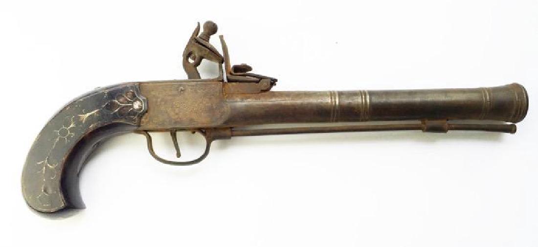 1820's English Blunderbuss, Theatrical Pistol: 19th century theatrical stage prop, Pirate's pistol, engraved "London". Box-lock type flintlock. Walnut Grip inlaid with Mother or Pearl on both sides. Attic found. Engraving also behind hammer & on t