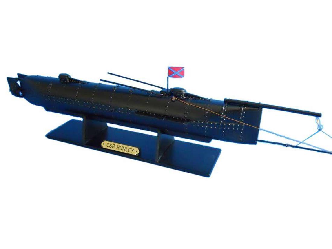 H.L. Hunley Limited Ironclad Model Submarine: H. L. Hunley Limited 24" model ship. Highly-detailed hatches. Harpoon torpedo with arming rope. Individual hull plates and rivets clearly visible. 24" L X 2" W X 8" H ( 1:30 scale ).