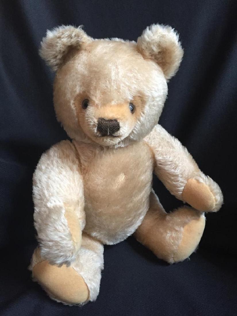 Mid Century Steiff Classic Articulated Teddy Bear: Mid 20th Century, classic German Steiff manufacturing company, 14" blonde mohair, glass eyes, thread mouth & nose, articulated stuffed animal teddy bear. * small patch of hair loss on chest & minor st