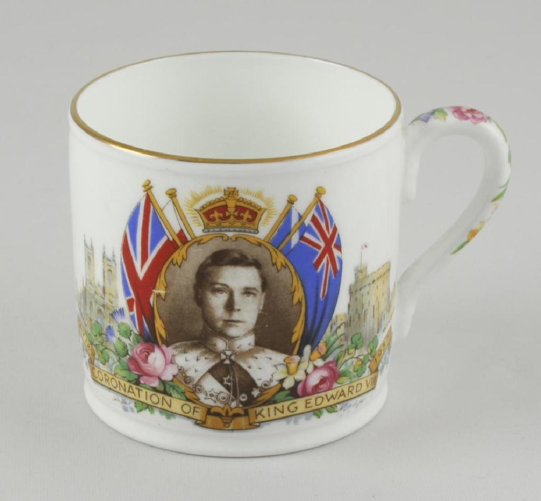 Rare 1937 King Edward Coronation Cup: Commemorative Aynsley bone china cup manufactured for the proposed May 12, 1937 Coronation of King Edward VIII. Portrait on front flanked by Westminster Abbey & Windsor Castle. Back depicts coat of ar
