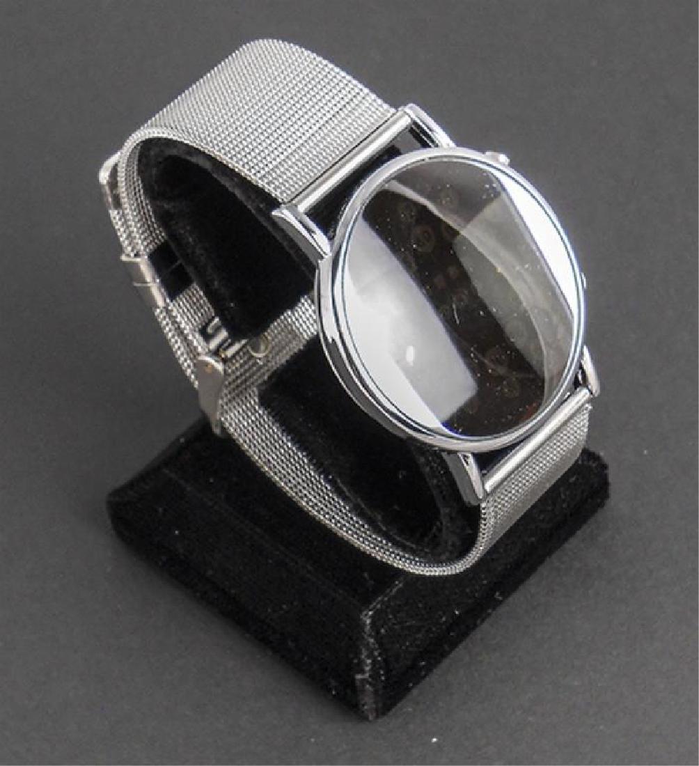 Stainless Steel Mod Mirror LED Wristwatch: Contemporary design stainless steel mesh band with LED complete calendar display. Water resistant case. New store stock requiring replacement battery.