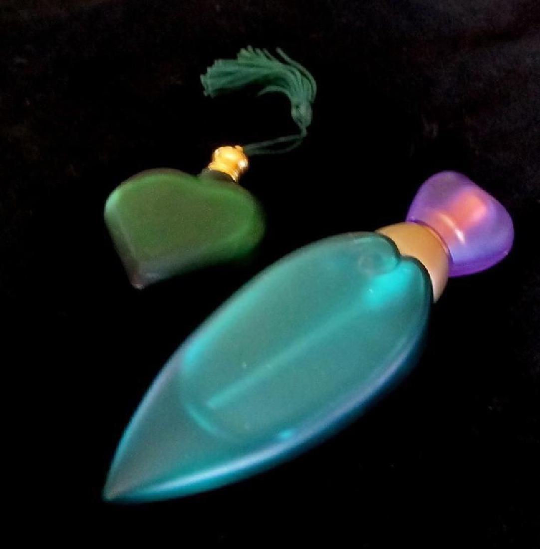 Vintage Heart Shaped Pocket Perfume Bottles: Vintage c1970's frosted glass, Trifari heart shaped pocket perfume bottles. Small one missing dauber. Small heart: Excellent vintage condition. Long heart: minor scratches & 3 areas have loss of green