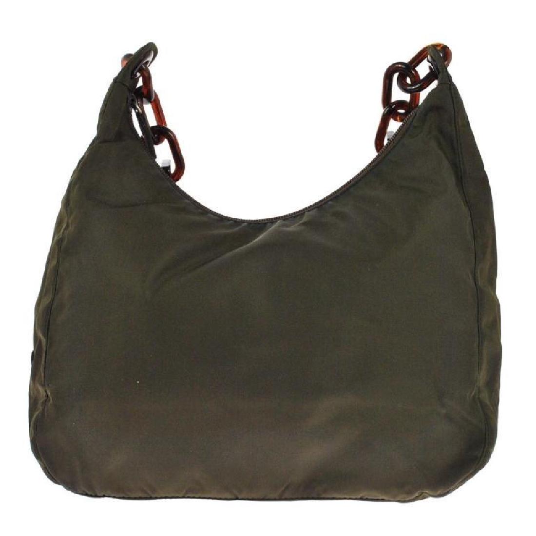 Authentic PRADA Nylon Olive Brown Purse Bag: Authentic PRADA nylon tote bag. Brown ( with olive green sheen ) with tortoise brown plastic partial chain handle. One main compartment with additional zippered pocket. PRADA tag on outside & inside.