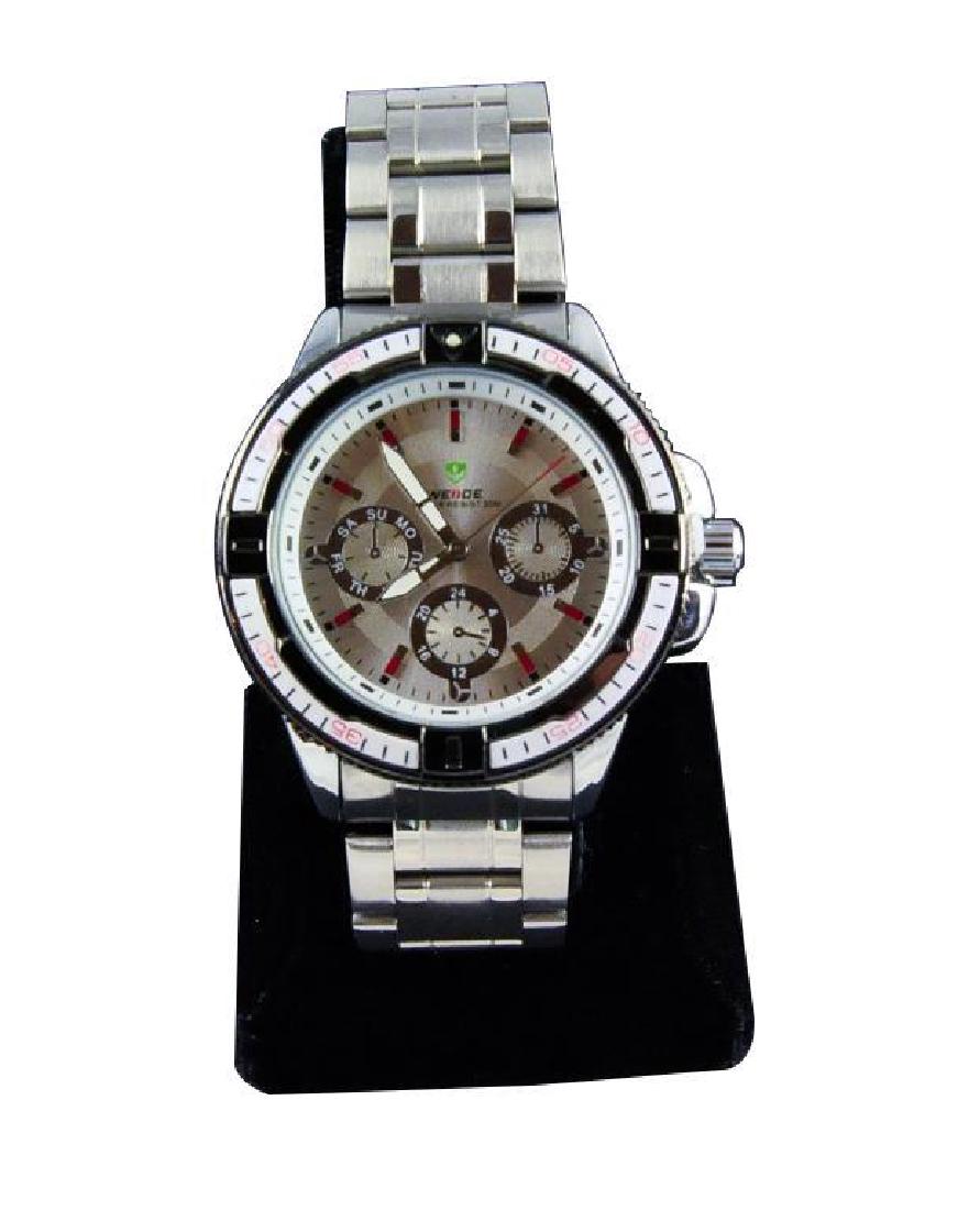 Men's Stainless Steel Sports Wristwatch: Water resistant stainless steel. Quartz movement, three dial with military time & calendar display. Rolex-style linked stainless band. New store stock but needs replacement battery.