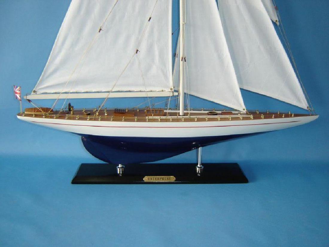 Wooden Enterprise Limited Model Sailboat Decoration 35": With the winning spirit of her famous namesake, the presence of these Limited Edition sailing ship models of America’s Cup winner Enterprisebrighten any room with the graceful speed of the waves and