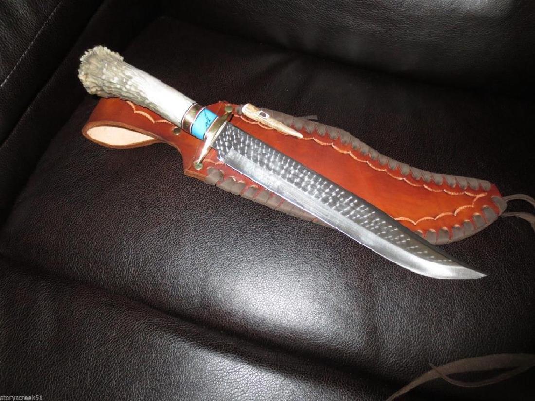 Custom Horn & Turquoise Bowie Knife: Ken Richardson custom knife, white tail crown shed antler horn with composite turquoise & brass handle. Brass spacers & hilt. Hand jeweled, blue spring steel tempered blade. Hermann Oak custom