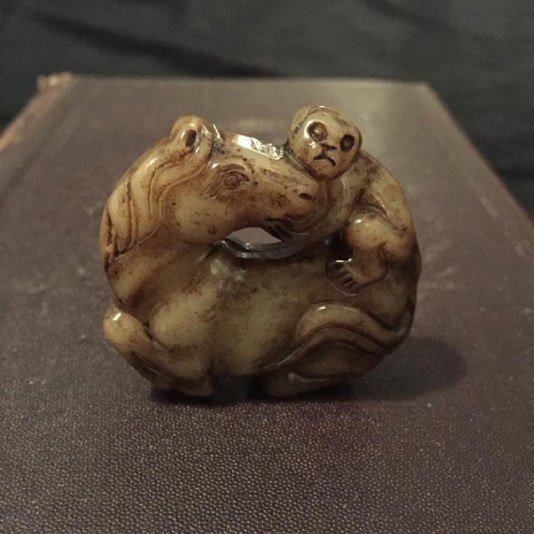 Carved Stone Monkey & Horse Totem Pendant: Chinese carved stone, in the form of a monkey riding a horse, totem or pendant. Symbolic for an immediate promotion in official rank. 2"D.