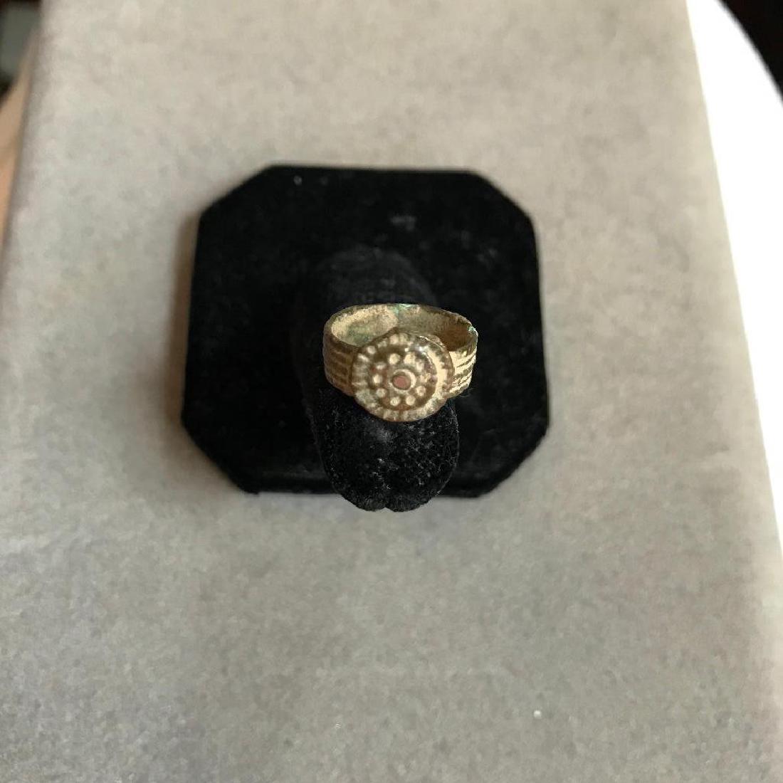 17th Century English bronze Child's Plague Ring: 17th Century bronze, English child's artifact ring. Revolutionary in its construction, withÂ theÂ band Â of rolled bronze, the pattern imparted by the roller. The bronze flower top ( posie ) was