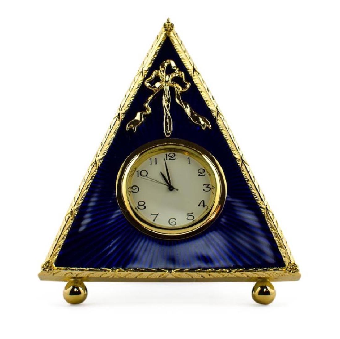 Faberge Inspired 5" Faberge Blue Triangle Enameled: 5" Faberge Blue Triangle Enameled Guilloche Russian Antique Style Clock5'' (H) Pewter, Enamel, Crystals Hand Painted Gift Boxed The photo frame is in two color gold-mounted blue enamel surrounded by a