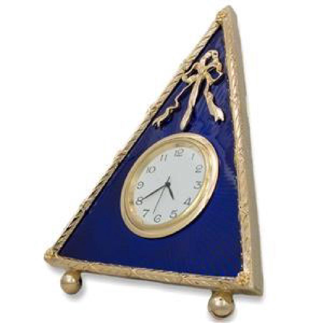 Faberge Inspired 5" Faberge Blue Triangle Enameled: Faberge InspiredÂ 5" Faberge Blue Triangle Enameled Guilloche Russian Antique Style Clock 5'' (H)Pewter, Enamel, Crystals Hand Painted Gift Boxed The photo frame is in two color gold-mounted blue en