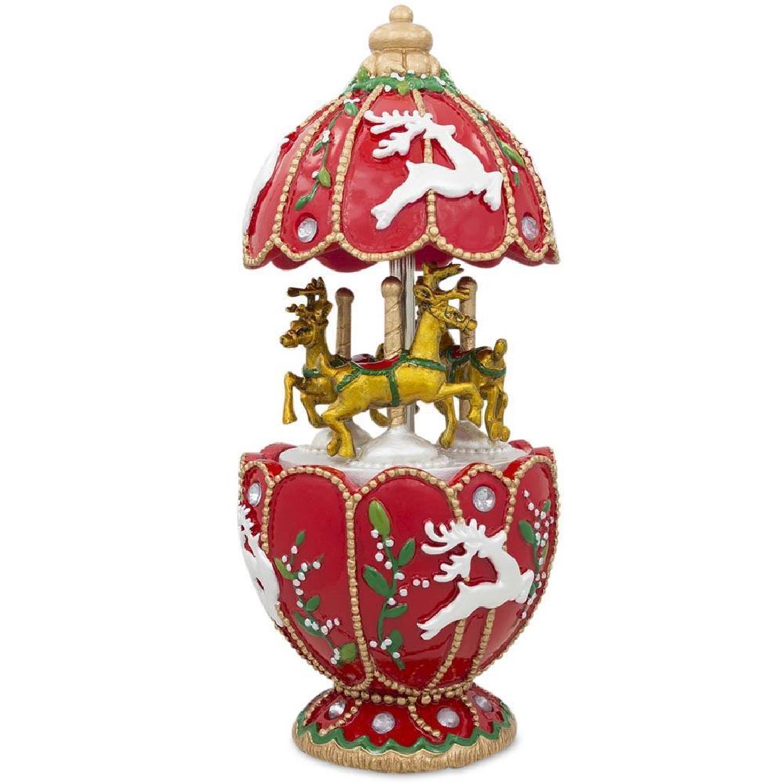 6.5" Rotating Animated Christmas Reindeer Carousel with: 6.5" Rotating Animated Christmas Reindeer Carousel with Music Box This charming Christmas Music Box features an egg shaped carousel with revolving reindeers. It plays a holiday tune "Joy to the World"