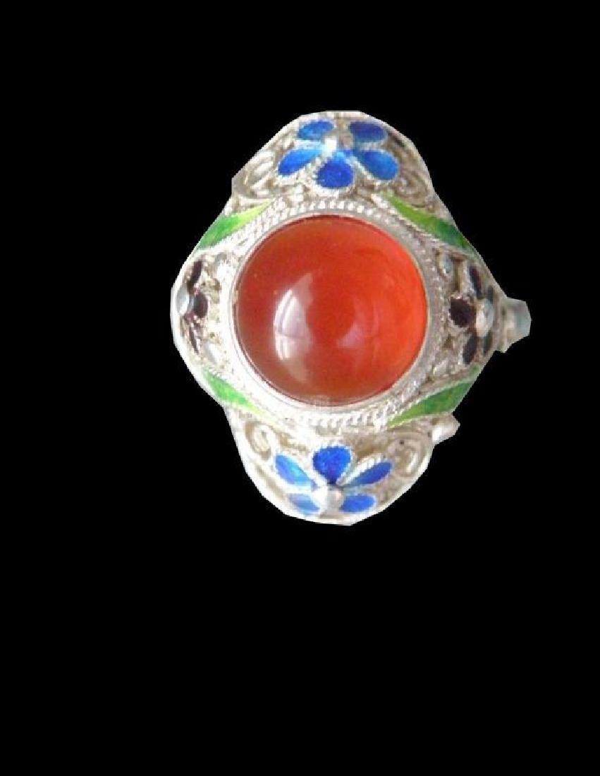 Vintage Carnelian Cabochon & Sterling Enamel Ring: Carnelian cabochon ( approx 9mm ) set into a marked .925 sterling silver band with floral enamel details. Size 9.