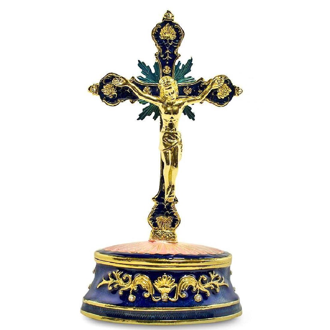 5.75" Enameled Standing Crucifix Rosary Keepsake: 5.75" Enameled Standing Crucifix Rosary Keepsake Trinket Box This sparkling trinket box is adorned with clear crystals and high-polished enamel with golden trim. It opens on a hinge and has a magnetic