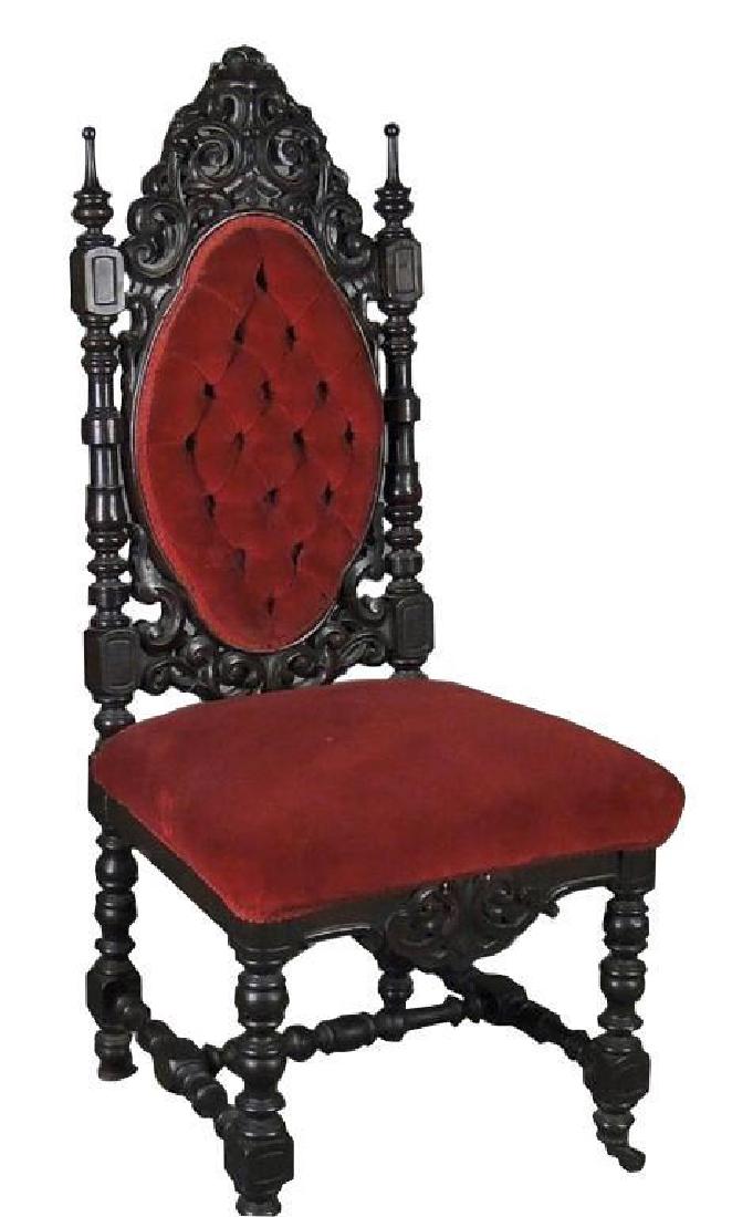 19thc Gothic Revival Walnut Side Chair: c1880 Gothic Revival walnut side chair. Carved & turned oval back with button tuffed panel. Upholstered in red velvet. On casters. 44" X 19" X 22".