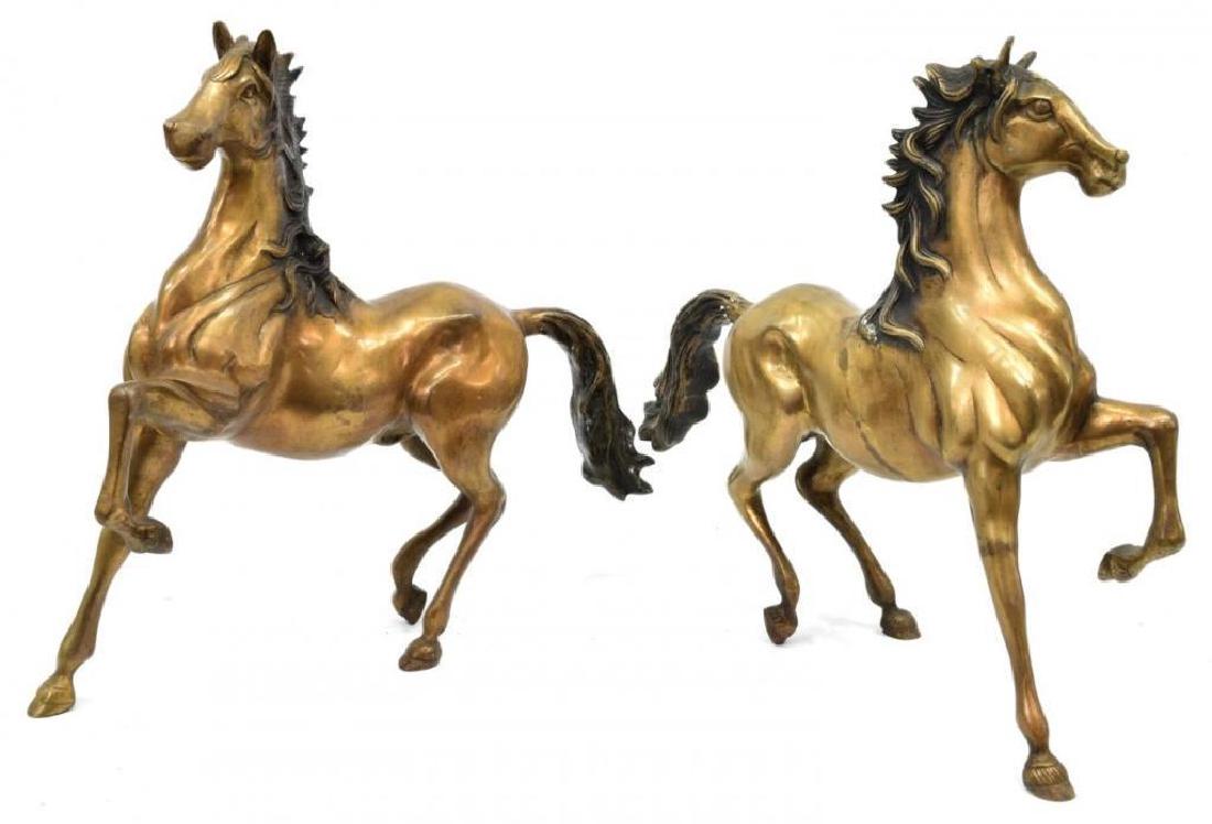 Pair of Patinated Bronze Horse Sculptures: Pair of patinated bronze figural sculptures, each modeled as a horse. Largest: 16" H X 17 1/2" L X 4 1/4" W.