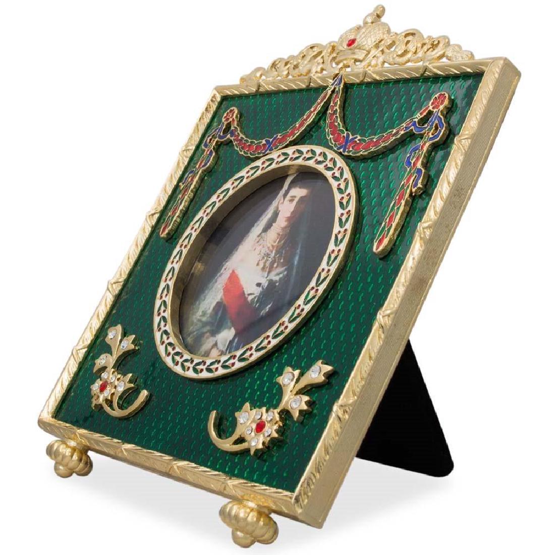 5" Faberge Square Green Enameled Guilloche Russian: 5" Faberge Square Green Enameled Gullioche Russian Antique Style Picture Frame 5'' (L) x 5" (W)Photo Insert Size: 2.25'' (D)Pewter, Enamel, Crystals Gift Boxed The Russian Royal Picture Frame is in a