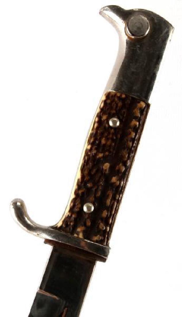 WWII German 3rd Reich Stag Handle Dress Bayonet: Measures 15 inches with 10 inch blade. In very good condition shows sign of age. Blade is marked Anton WingenJB Solingen. Original felt in groove where attaches to the firearm. Original scabard with l