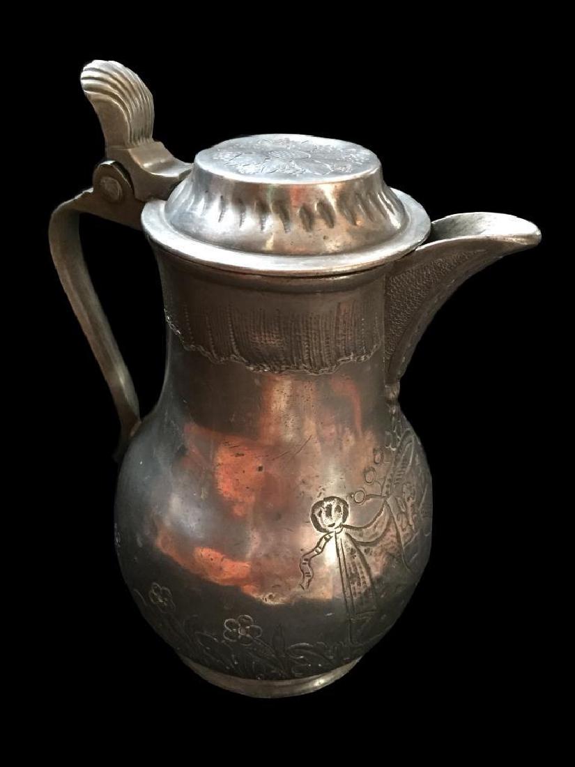 18thc German Pewter Pitcher Tankard: Beautifully etched,18th Century Colonial period, German Fein Zinn pewter pitcher, tankard. Crown & shield focal design with wild flowers deeply etched around the diameter. Floral design on the lid wit