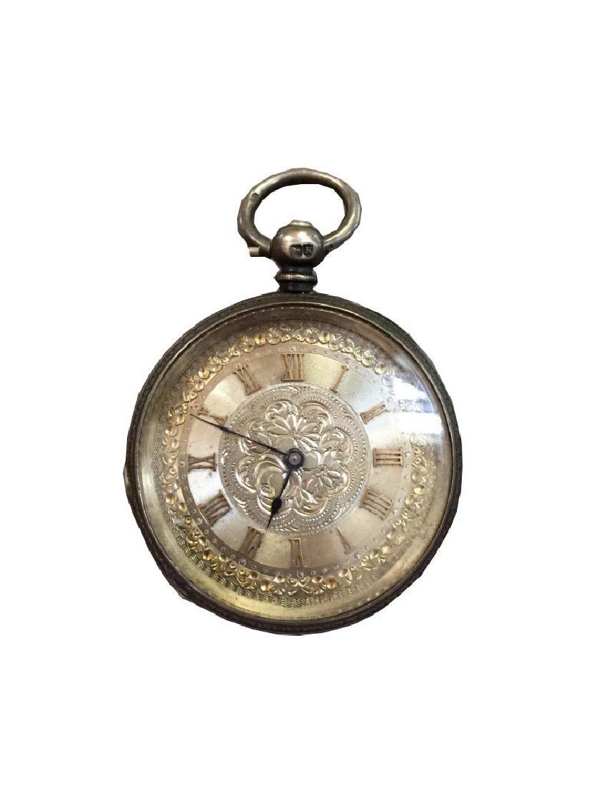 1885 Ornate British Hallmarked Silver Pocket Watch: Ornate 1885 British sterling silver pocket watch, hallmarked on inside case & inside dust cover with a "K" within shield & a lion stamp. Gold Roman numerals & floral embellished dial, surrounded by an