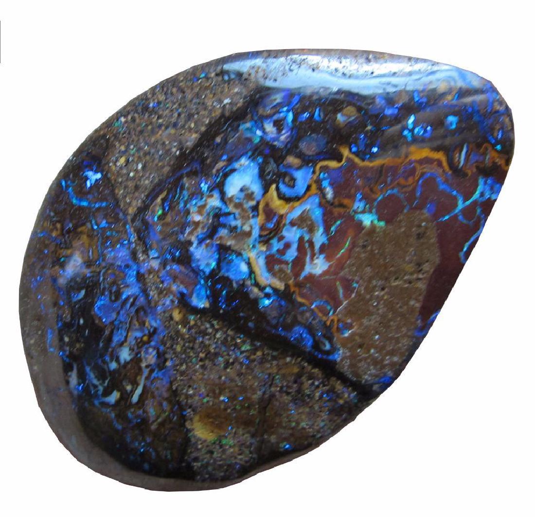 38.85 carat undrilled boulder opal, 35 x 25 x 4mm: 38.85 carat undrilled boulder opal, 35 x 25 x 4mm, double sided with great pattern and color on both sides. One side is predominantly blue veins while the other side has green fire. Both sides are sho