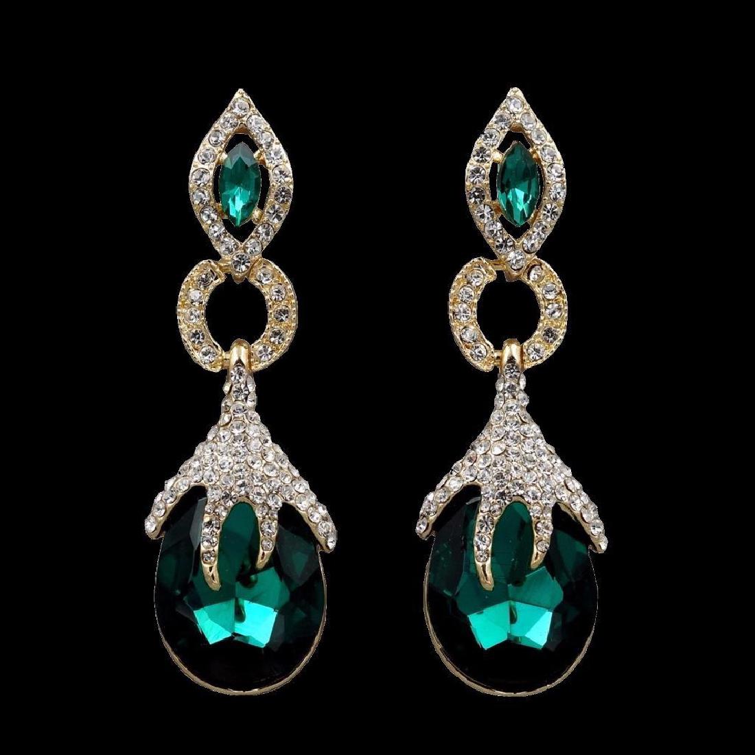 18k Gold Plated Gp Emerald Green Crystal Rhinestone: Pierced earrings Stone / Color: Czech crystal / Green ( Emerald ) Metal / Color: 18K gold plated alloy / 18K gold Length: 2.75" Weight: One earring is 0.60 oz Quantity: 1 pair