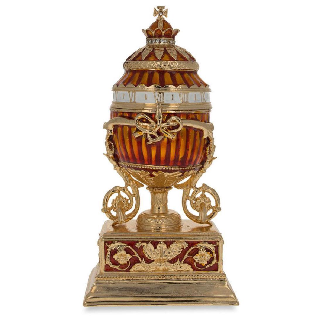 1899 Bouquet Of Lilies Clock Faberge Egg: 1899 Bouquet of Lilies Clock Faberge Egg 6 Inches Tall X 2.5 Inches Diameter Enamel, Gold Plated Pewter Hand Painted Gift Boxed This hand-painted sparkling egg is adorned with a high-polished enamel w