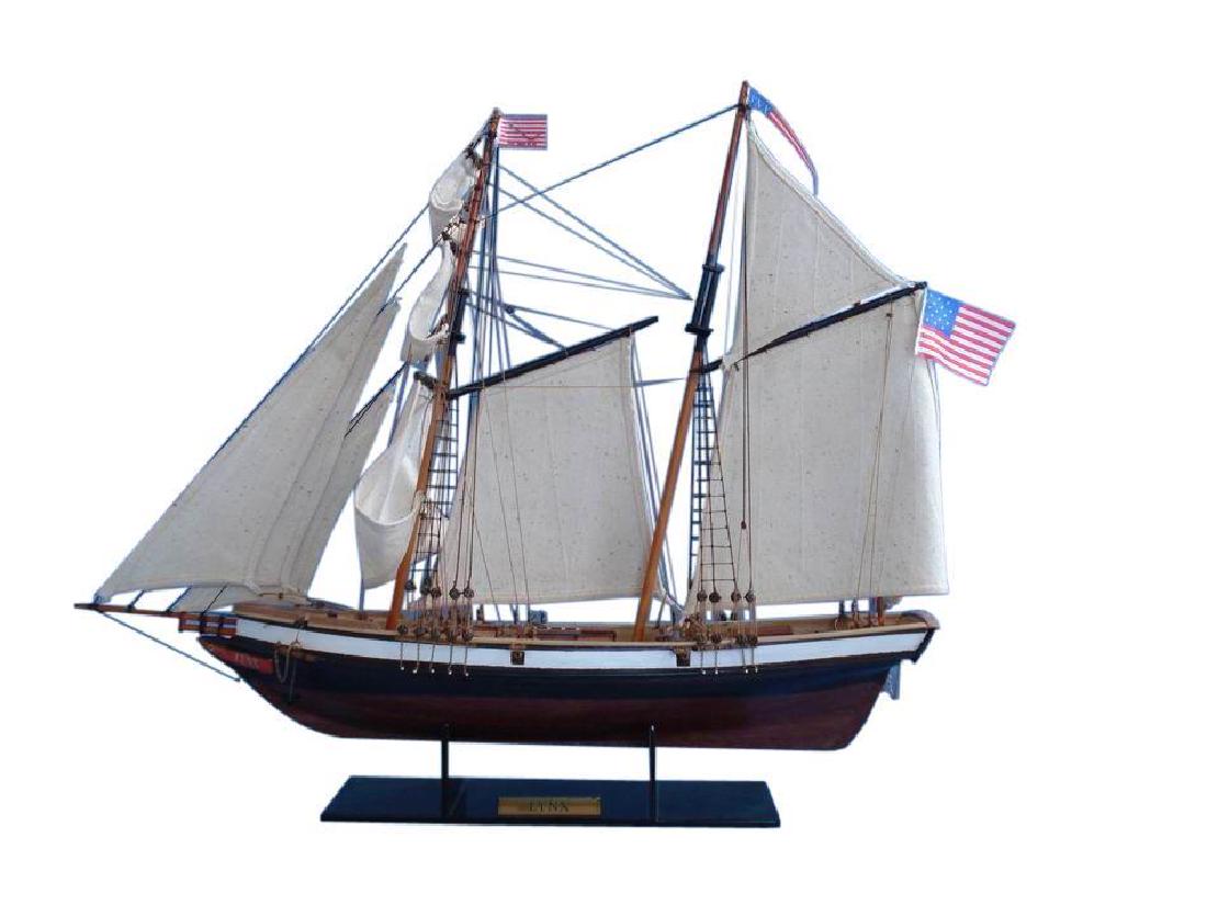 Wooden Lynx Model Ship 24": A highly accurate and detailed scale model yacht designed for the discriminating sailboat enthusiast, this tall model ship Lynx topsail schooner is a museum quality replica. Outfitted as a privateer d
