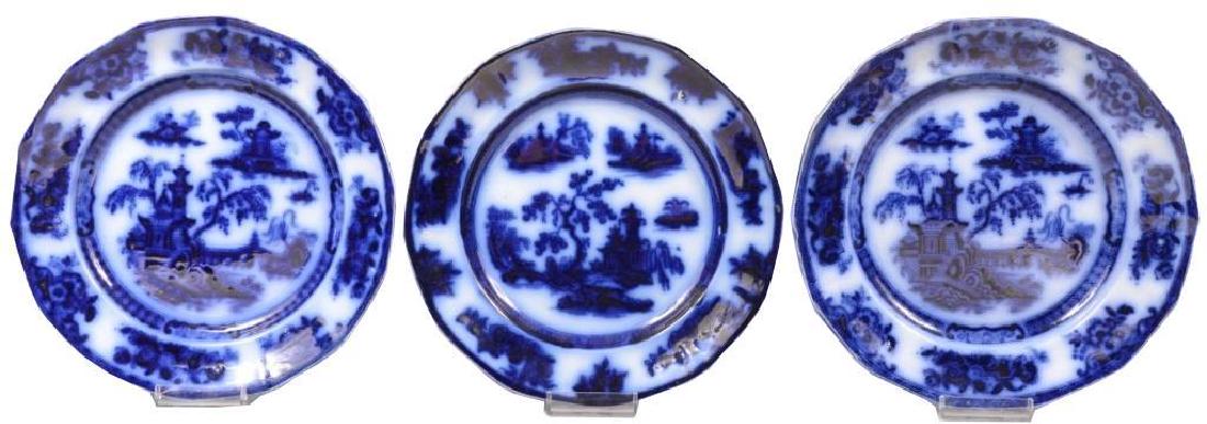 Group of 19thc Challinor Pelew Flow Blue Plates: Set of three ironstone plates, fourteen sided rim flow blue. Edward Challinor produced these ironstone plates at his pottery in Tunstall, Staffordshire, England between 1842 - 1867. Pelew pattern, fea