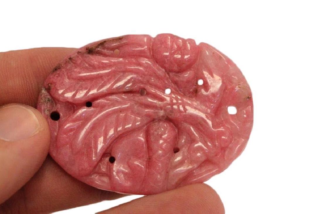 Carved Rhodochrosite Bird Pendant: Bird of paradise pendant medallion, hand-carved from a rhodochrosite gemstone, also known as Inca rose stone. 2"L.