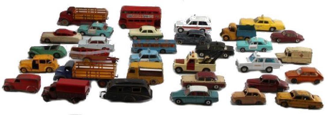 Vintage Dinky Toys Diecast Meccano Ltd: Description: Lot of 32 includes halesowen trailer, land rover tow truck, double-decker bus, ambulances, Ford Escort police cars, Humber Hawk police car, Vauxhall Viva, mini Clubman, Viceroy 37 coach,
