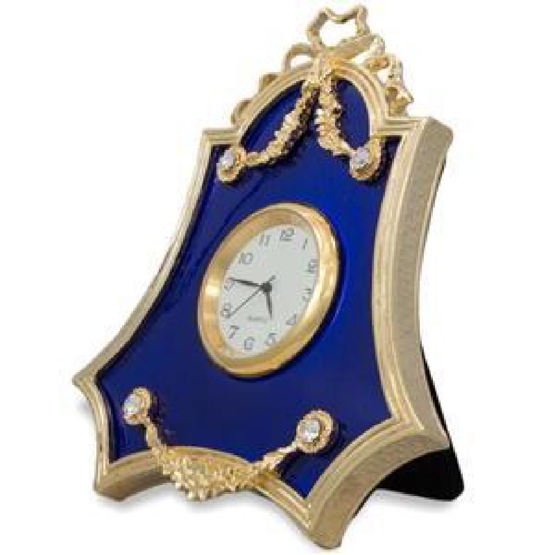 Faberge Inspired, Royal Blue Guilloche Enamel Russian: Faberge Â®RoyaI Blue Guilloche Enamel Russian Frame with Clock (new) This framed clock is in two color gold-mounted blue enamel surrounded by a czechÂ®crystal set in ribbon tie, then suspended by 