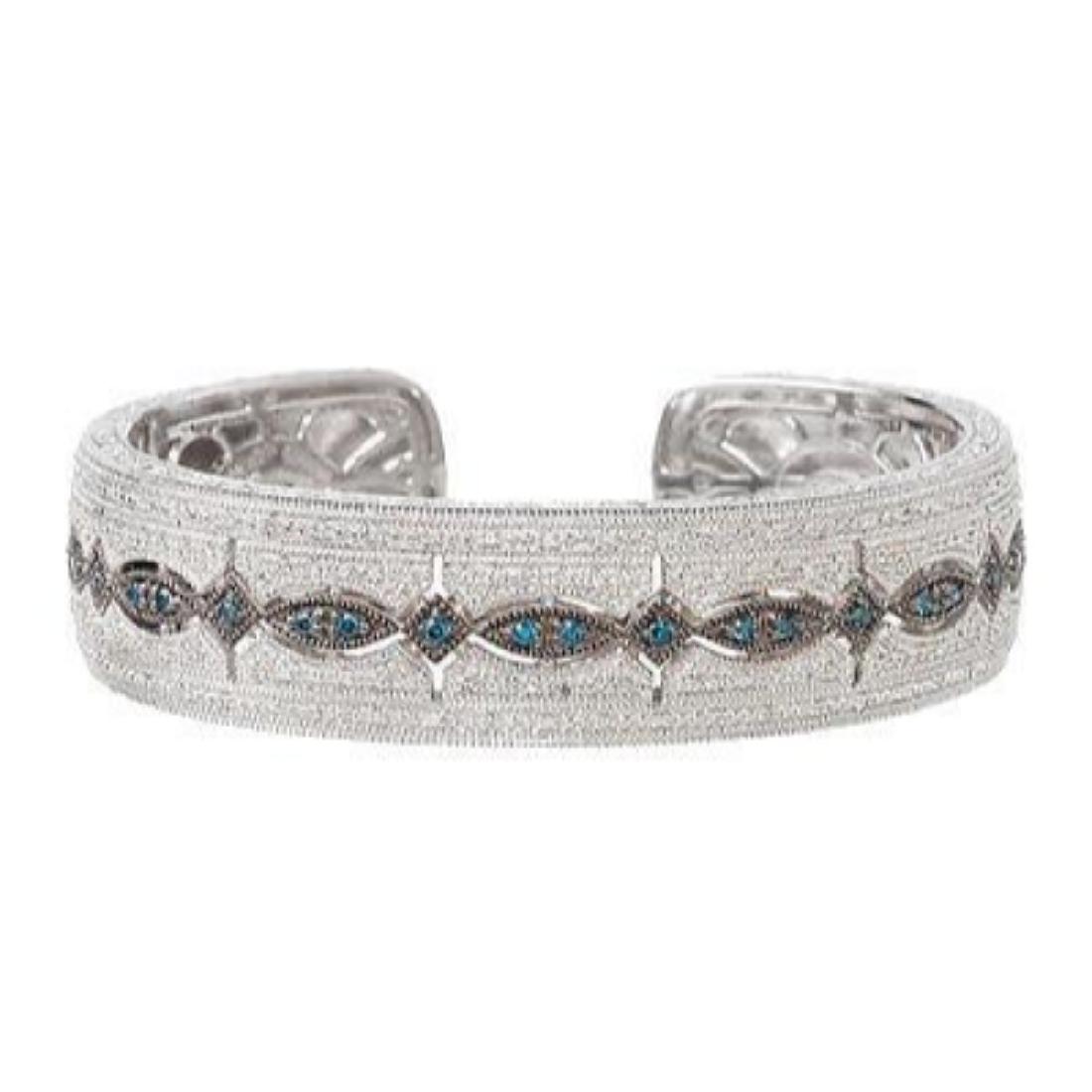 Blue & White 3/4 Ct Diamond Sterling Silver Bangle Cuff: Upscale Designer Jewelry (costume) Size Small. My wrist measures 6 1/4" and it fits me quite well. Weighs in at 47.6 grams. The detail inside and out is exqBrand: Affinity Main Stone Creation: Natural