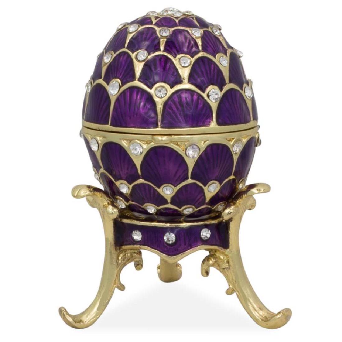 2.25" Crystal Purple Arches Enameled Faberge Inspired: 2.25" Crystal Purple Arches Enameled Faberge Inspired Easter Egg 2.25'' (H) Enamel Gold Plated Pewter, Austrian Crystals Hand-painted Russian Style Gift Boxed This sparkling egg is adorned with clear