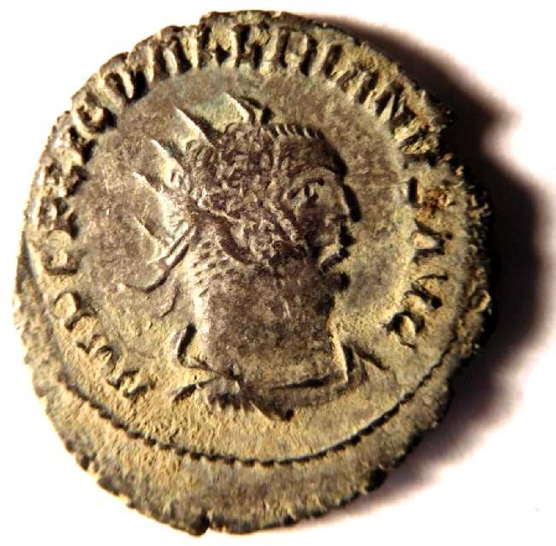 Ancient Bronze Radiate of Emperor Gallinus (253-268: The antoninianus (plural antoniniani) is a modern name for a type of coin minted by the Roman Empire in the 3rd century A.D. Initially, the antoninianus was silver and carried a value of 2