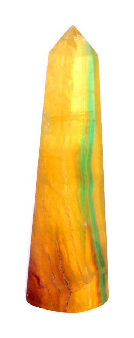Egyptian Natural Mini 8 Faceted 70MM Yellow Fluorite: Size : 70mm x 20mm Approx. Weight : 50 Grams.Approx. Cut : As Per In Picture Color : Yellow & Green Mix. These 8 sided Faceted cut and polished Yellow Fluorite Mini Obelisk Tower Made In India.Fluorit
