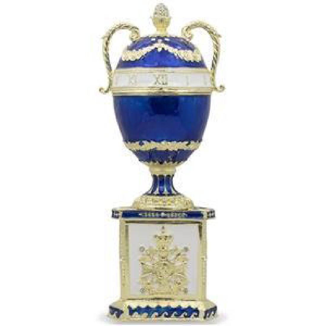 1895 Blue Serpent Clock Russian Faberge Egg 7": 1895 Blue Serpent Clock Faberge Egg Peter Carl Faberge is the world's most famous jeweler who created eternally original pieces of art. The series of Easter eggs created by Faberge for the Russian Imp