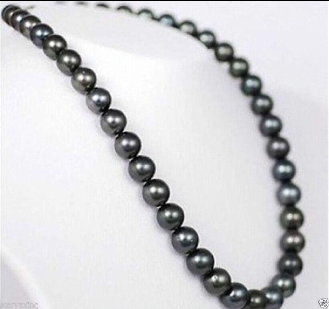 23" 9-10mm Aaa Tahitian Natural Black Pearl Necklace: Length (inches): 23 Style: Chain Metal: Yellow Gold Metal Purity: 14k Main Stone: Pearl Main Stone Creation: Natural Color: Black - 9830-031618-EB-92608
