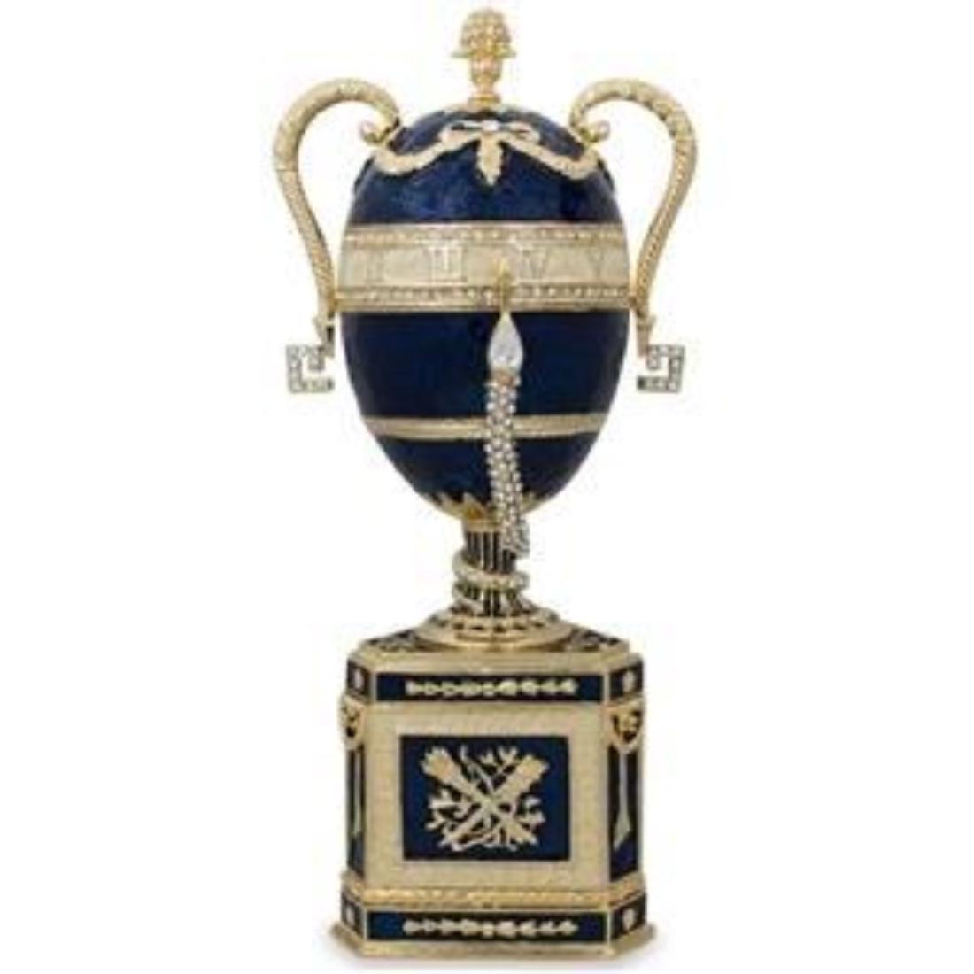 1895 Blue Serpent Clock Russian Faberge Egg: 1895 Blue Serpent Clock Russian Faberge Egg 7.75'' (H) X 2.75'' (D) Pewter, Enamel, Crystals Boxed Faberge Eggs have a remarkable story and while the original Faberge eggs are virtually priceless, ext