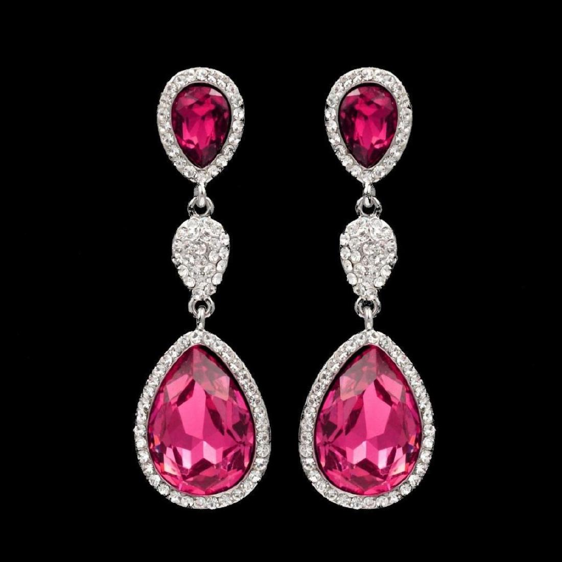 Rhodium Plated Fuchsia Crystal Rhinestone Chandelier: Type: Pierced earrings. Stone / Color: Czech crystal / Fuchsia, Clear. Metal / Color: Rhodium plated / Rhodium. Length: 2.125". Weight: One earring is 0.21 oz. Quantity: 1 pair