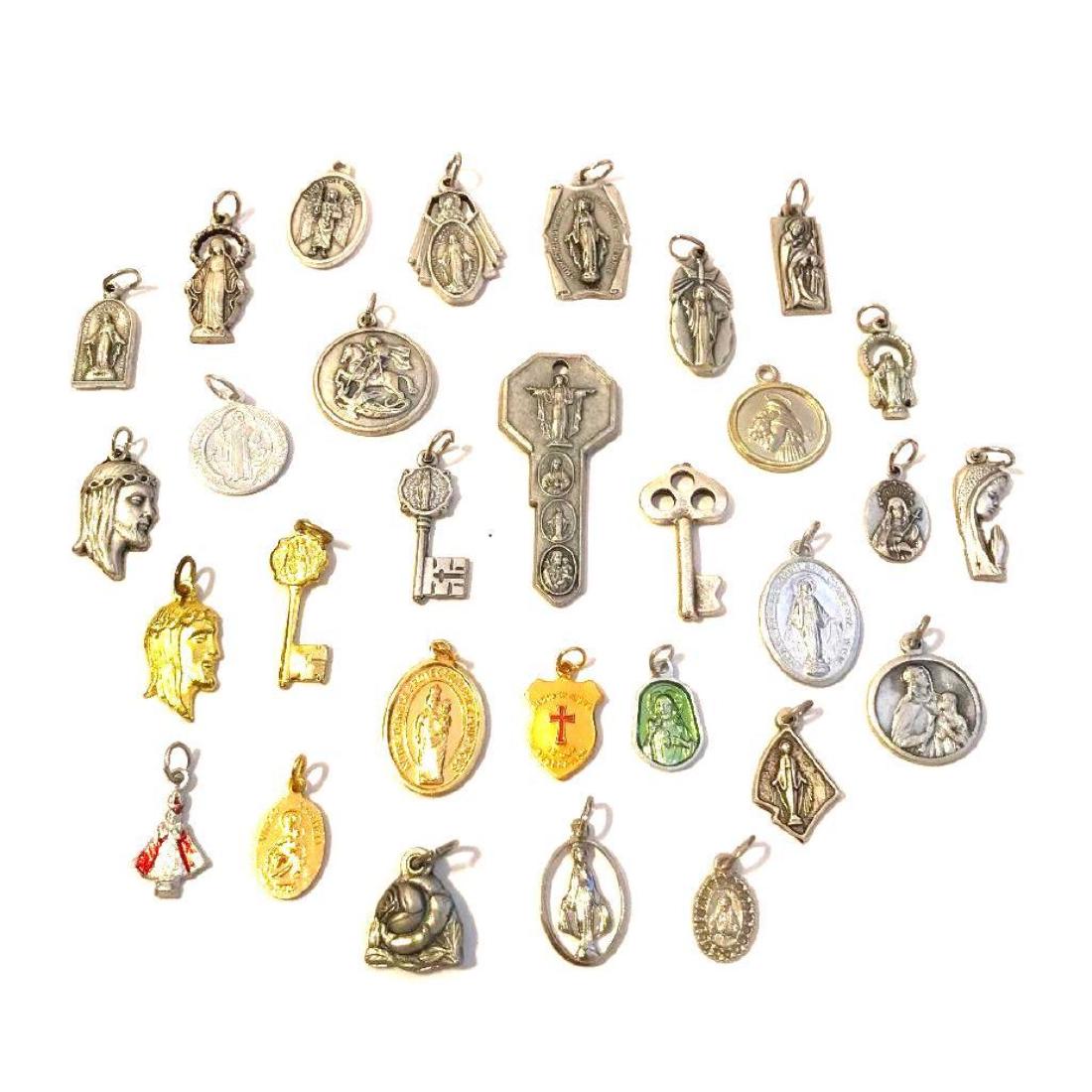 Group of Catholic Rosary Charms & Medals: Group of 30 Catholic silver & gold plated charms & medals, most stamped "Italy" on the reverse. Features Jesus crown of thorns, saints, angels, keys. Rosary & jewelry making.