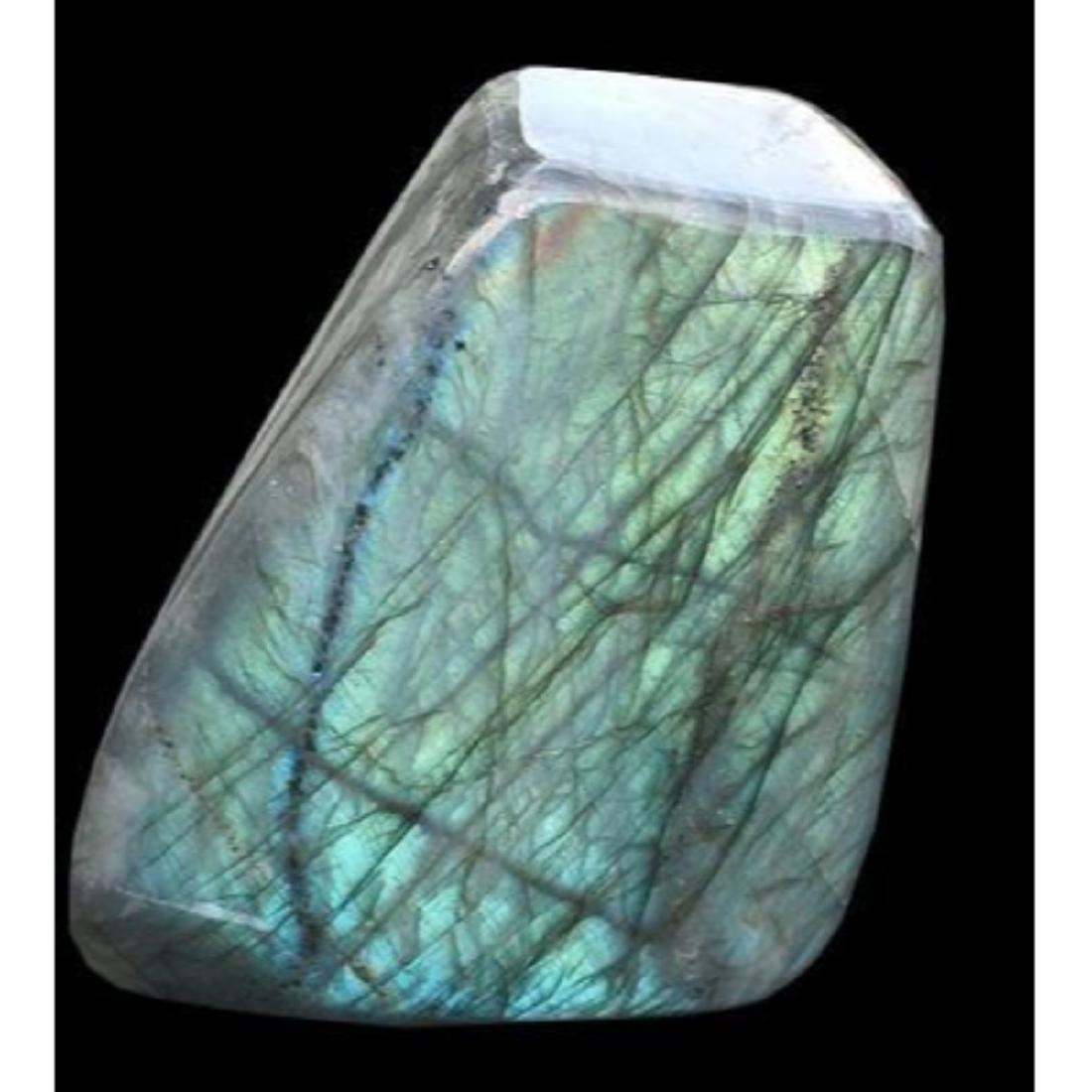Massive Madagascar Labradorite Display Specimen: Natural freeform shape, highly polished labradorite gemstone. Massive display specimen with vibrant color. 1lb 4oz weight. 4" L X 3" W X 1 1/2" H. Madagascar origin.